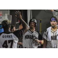 Justin O'Conner of the Kansas City Monarchs readies for a high five