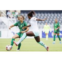 Lexington SC midfielder Shea Moyer (left) battles a Fort Lauderdale United FC defender