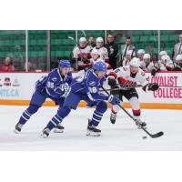 Syracuse Crunch forward Niko Huuhtanen races forward with the puck vs. the Belleville Senators