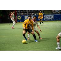 Alessandro Canale of the Tacoma Stars looks to pass while fending off a Chihuahua defender last season